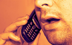 man on phone, face only
